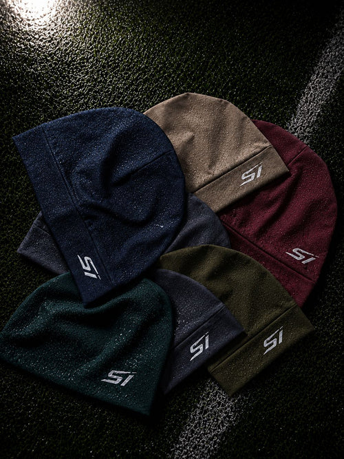The Skully Style II beanie colour range — Stone, Gray, Blue and Khaki with left-side SI logo